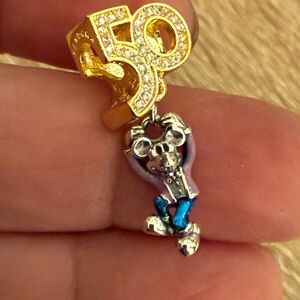 Gold and Silver Charm with Blue Accents